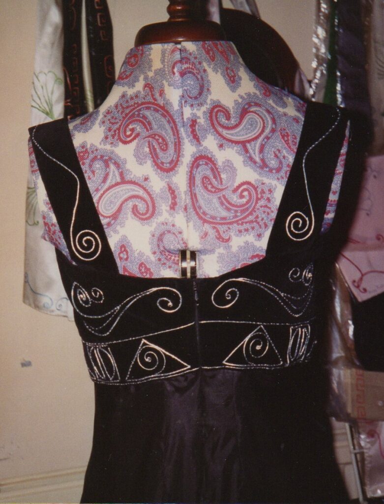 Detail of silver hand embroidery on a commissioned hand sewn black silk dress